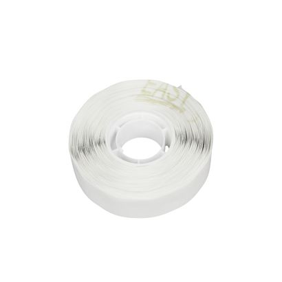 Pastilles auto-adhésives sur un rouleau pour dérouleur manuel null